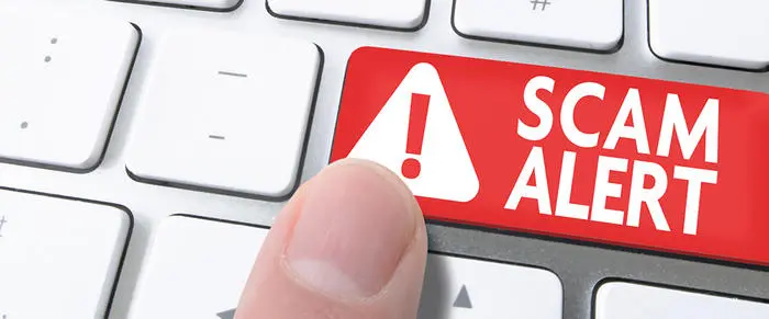 scam alert button graphic